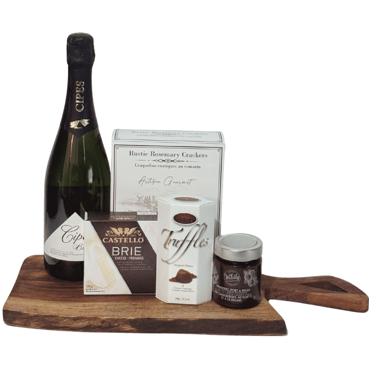 A Toast to the Season holiday wine and cheese gift with Canadian sparkling wine, Brie, artisan crackers, cranberry spread and chocolate truffles on a wood serving board