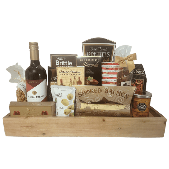 Wine & Gourmet Entertainer Board with wine, cheeses, salmon, spreads, nuts, chocolates, and gourmet treats, displayed on a keepsake wine glass shelf board.