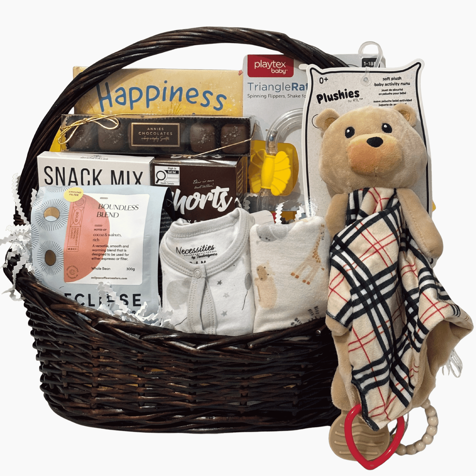 A Warm Welcome baby and parents gift basket with baby essentials, coffee, cookies and gourmet treats in a gender-neutral colour palette.