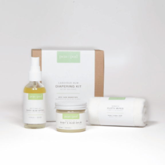 Image showcasing organic and handcrafted diapering essentials in a kit, featuring 'All Things Jill' Smooth as a Baby's Bum Balm, 'All Things Jill' Bottoms Up! Baby Bum Spray, and 'All Things Jill' Bamboo Cloth Wipes.