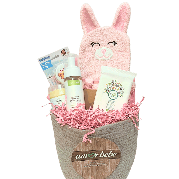 Pink Bunny Baby Gift Basket contents - washcloth mitt, washcloths, biodegradable wipes, rattle toy, baby body wash, and baby butter