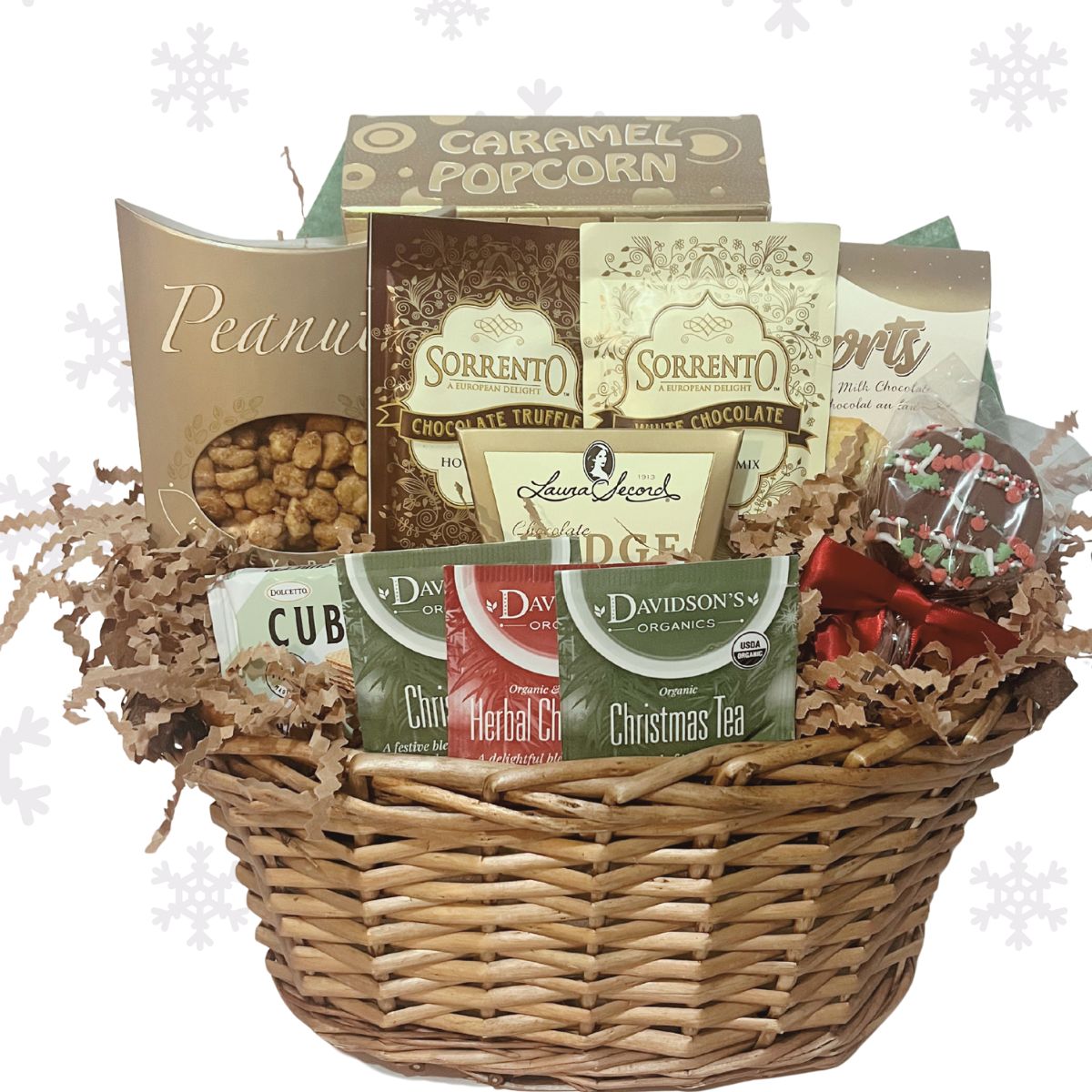Comfort & Joy Holiday Gift Basket wrapped in gold and cream with festive ribbon, featuring hot chocolate, cookies, caramel popcorn, tea, and artisan chocolates.