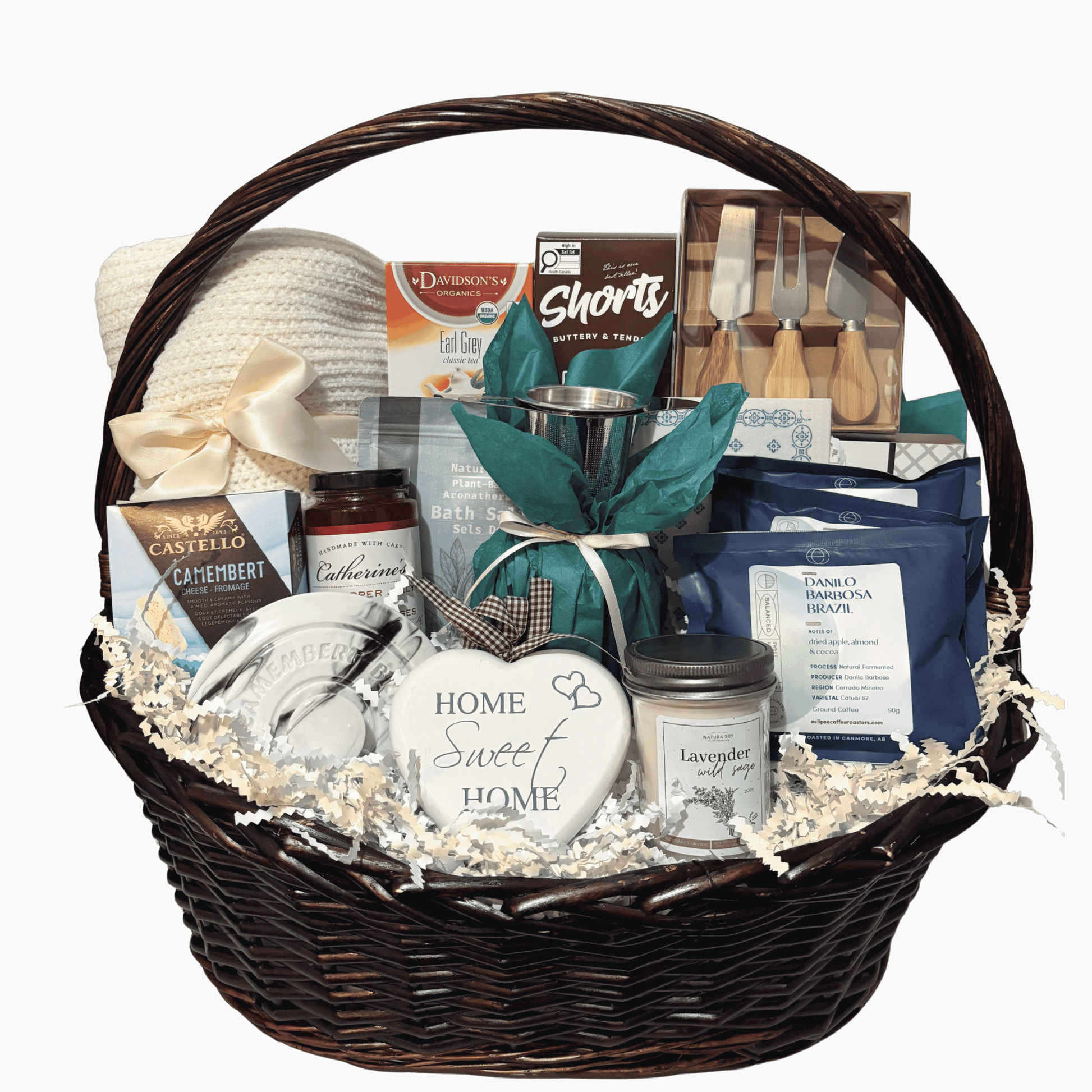 Cozy Home Collection housewarming gift basket with a plush blanket, gourmet treats, coffee, tea, brie baker and candle.