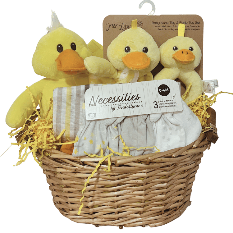 Baby gift basket with plush ducks and baby mitts and blanket on a transparent background