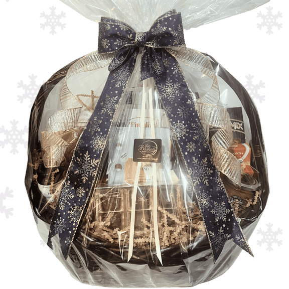 Premium Holiday Gift basket with sweet and savoury treats on a transparent background wrapped in cellophane and sparkly festive snowflake ribbon.