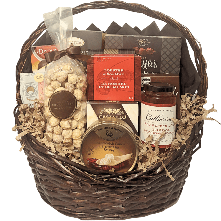 Luxury gourmet gift basket featuring artisan cheeses, smoked salmon pâté, handcrafted chocolates, gourmet crackers, specialty coffee, premium tea, popcorn, preserves, and entertaining favourites, beautifully presented for local Calgary gift delivery.