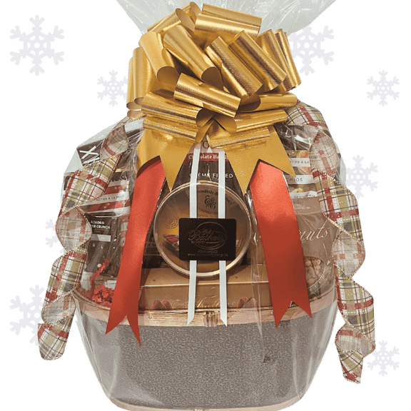 Gift basket with a gold bow and plaid ribbon on a transparent background with snowflake decorations.