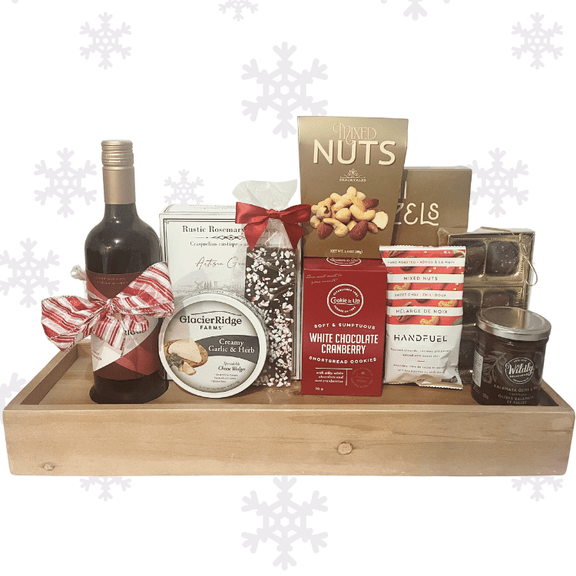 Holiday Wine & Delectables Gift Board with wine, crackers, cheeses, chocolates, nuts, and gourmet treats arranged on a wooden wine shelf board in standard size.