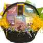 Wicker basket filled with assorted Easter chocolates in cheerful pastel wrapping.