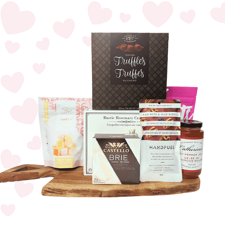 Love at First Bite Valentine’s charcuterie gift basket with gourmet crackers, brie cheese, chocolates, salmon, and sweet treats, beautifully packaged for Valentine’s Day