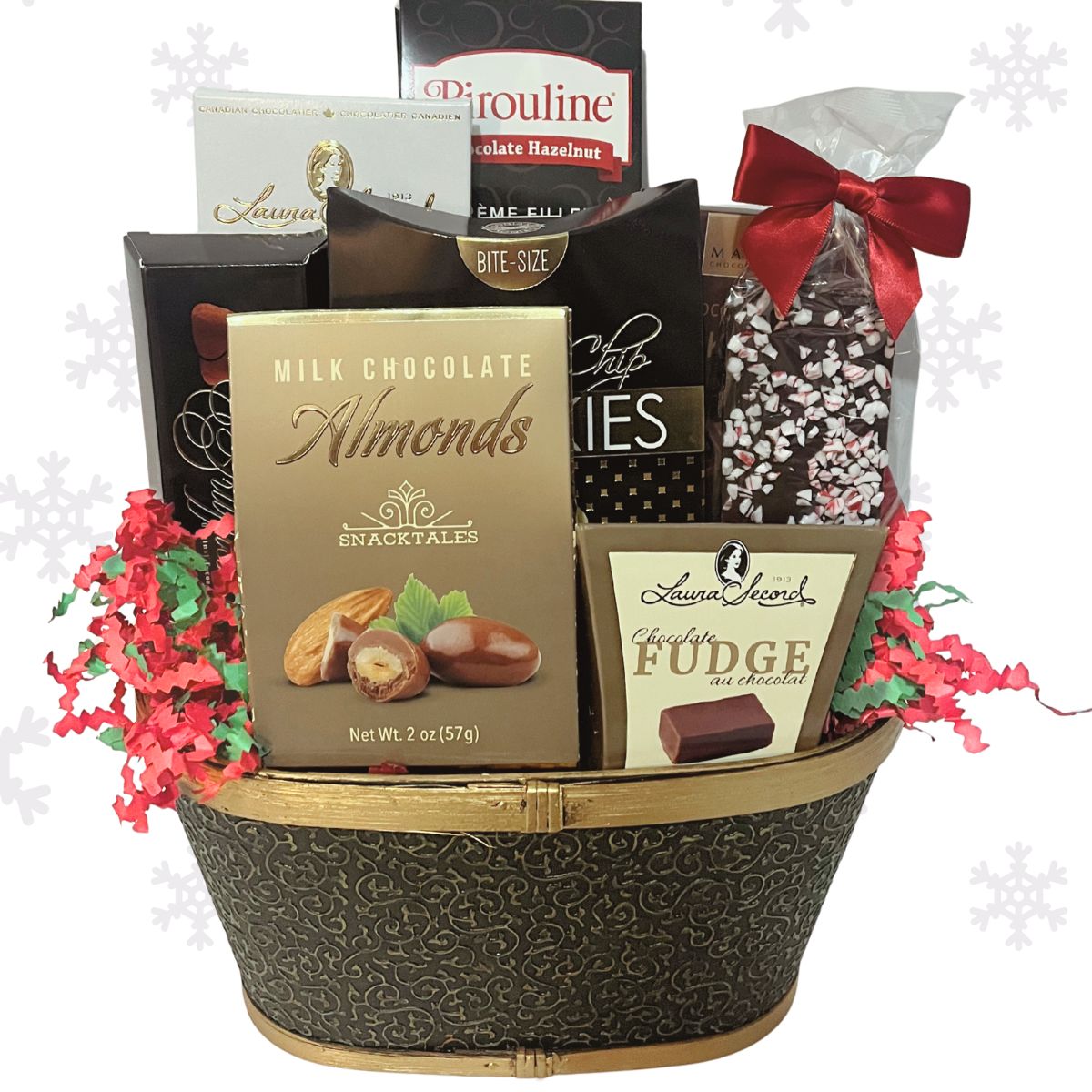 Chocolate gift basket with various chocolate items and a red bow on a white background