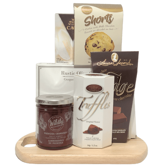 Merry & Bright holiday gift basket with gourmet snacks and festive Christmas treats