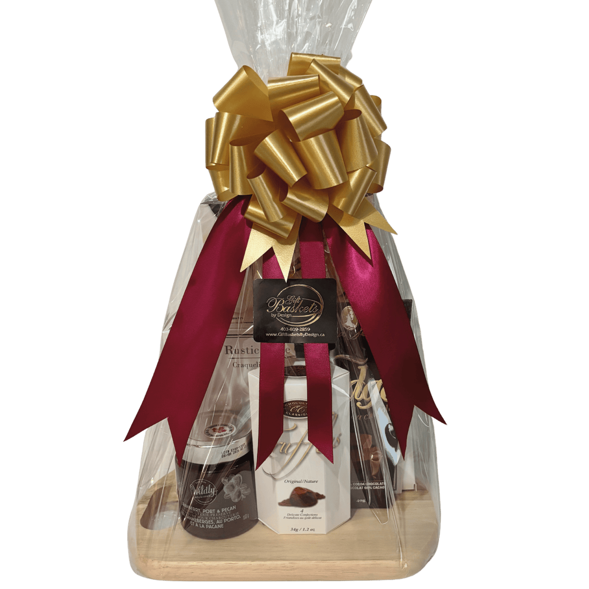 Merry & Bright holiday gift basket wrapped in cellophane with festive ribbon