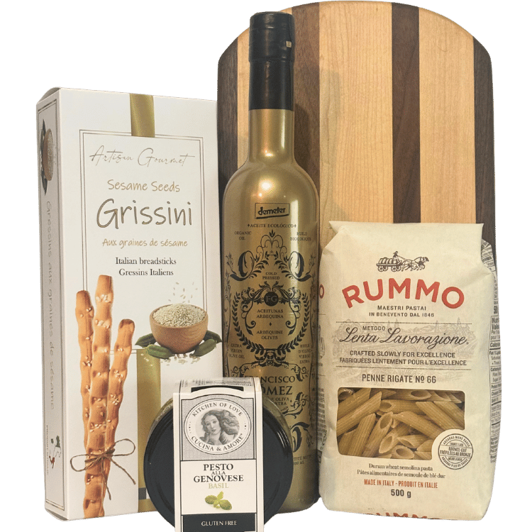 Rustic Elegance artisan pantry gift with handcrafted hardwood serving board, olive oil, pasta, pesto and breadsticks in Calgary.