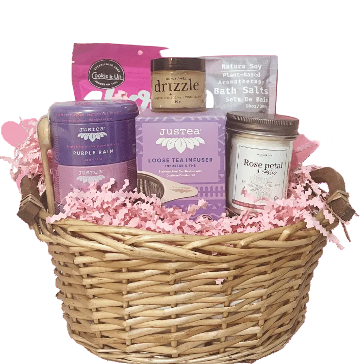 Steep and Soak spa gift basket with tea, bath soak, candle and chocolates arranged for self care, birthdays and Mother’s Day, show in signature size.
