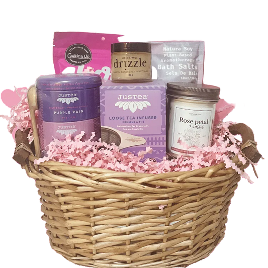 Steep and Soak spa gift basket with tea, bath soak, candle and chocolates arranged for self care, birthdays and Mother’s Day, show in signature size.
