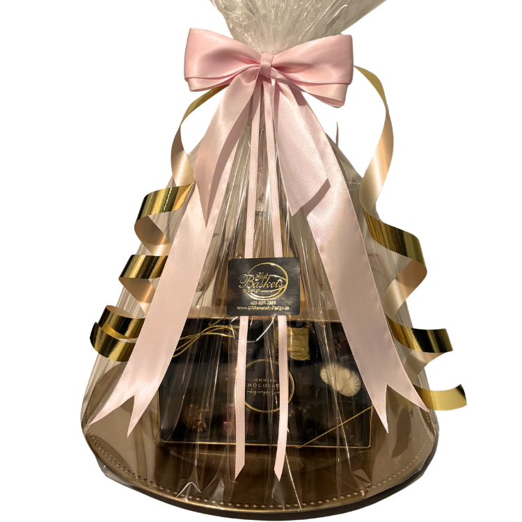The Pink & Gold Celebration with Champagne, premium chocolates, and two keepsake flutes for delivery in Calgary
