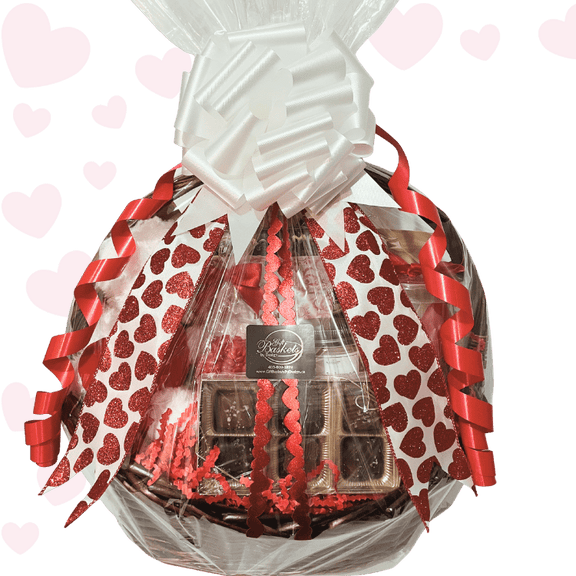 Timeless Romantic Valentine’s Day gift basket with plush teddy bear, artisan chocolates, caramel popcorn, Turkish delight, spa bath soak, candle, and romantic wine glass, wrapped with heart ribbons.